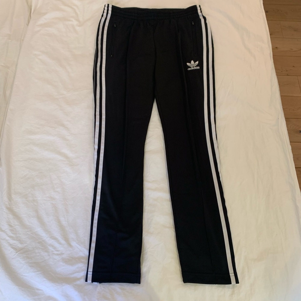 Adidas Originals Primeblue Superstar track pants in the color Black
